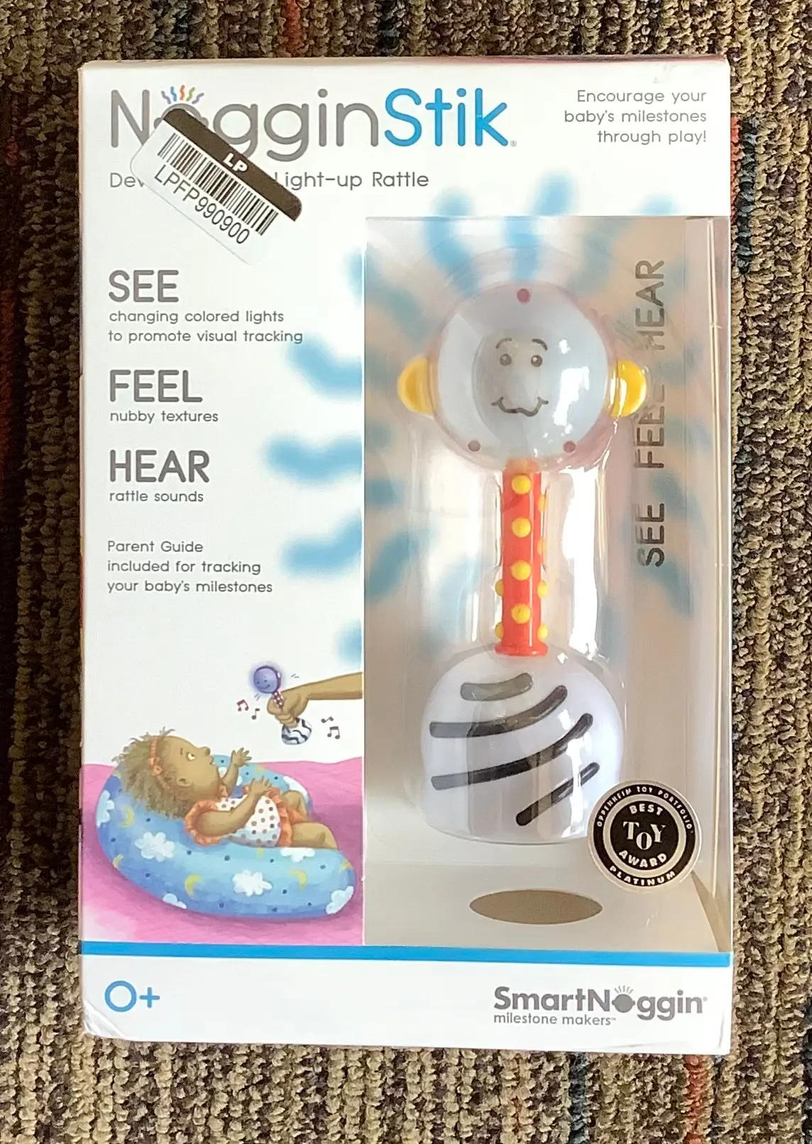 Smartnoggin Nogginstik Developmental Light-Up Rattle And
Parent Guide 1