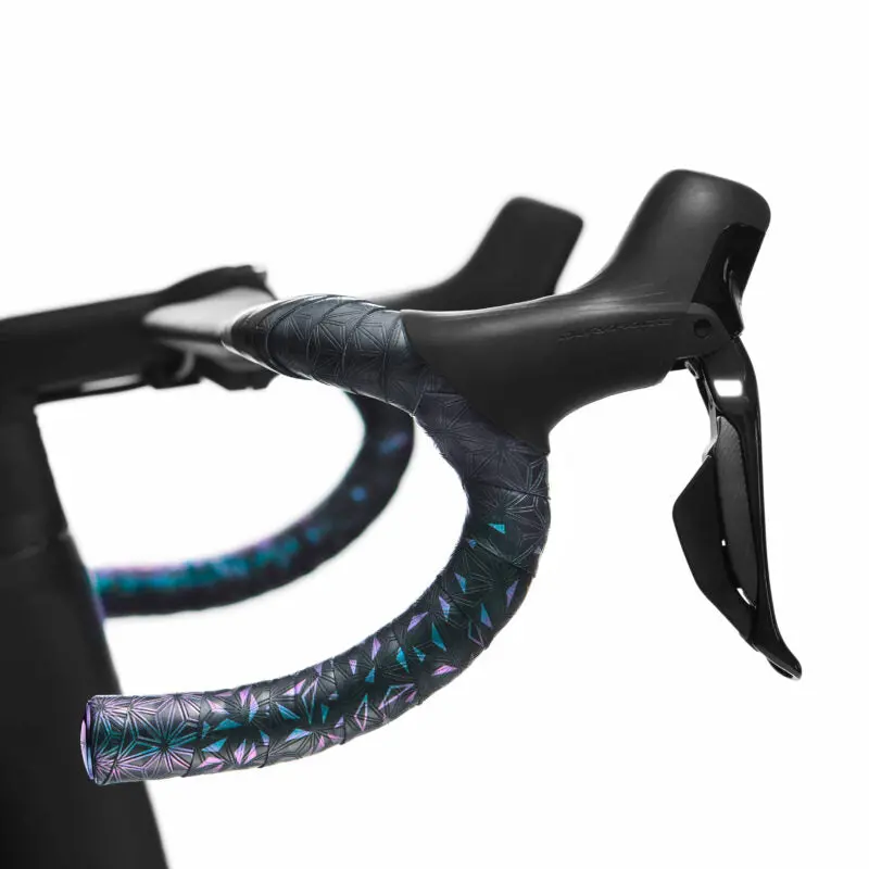 Supacaz Super Sticky Kush Star Fade – Oil Slick W/ Oil Slick Plugs 1