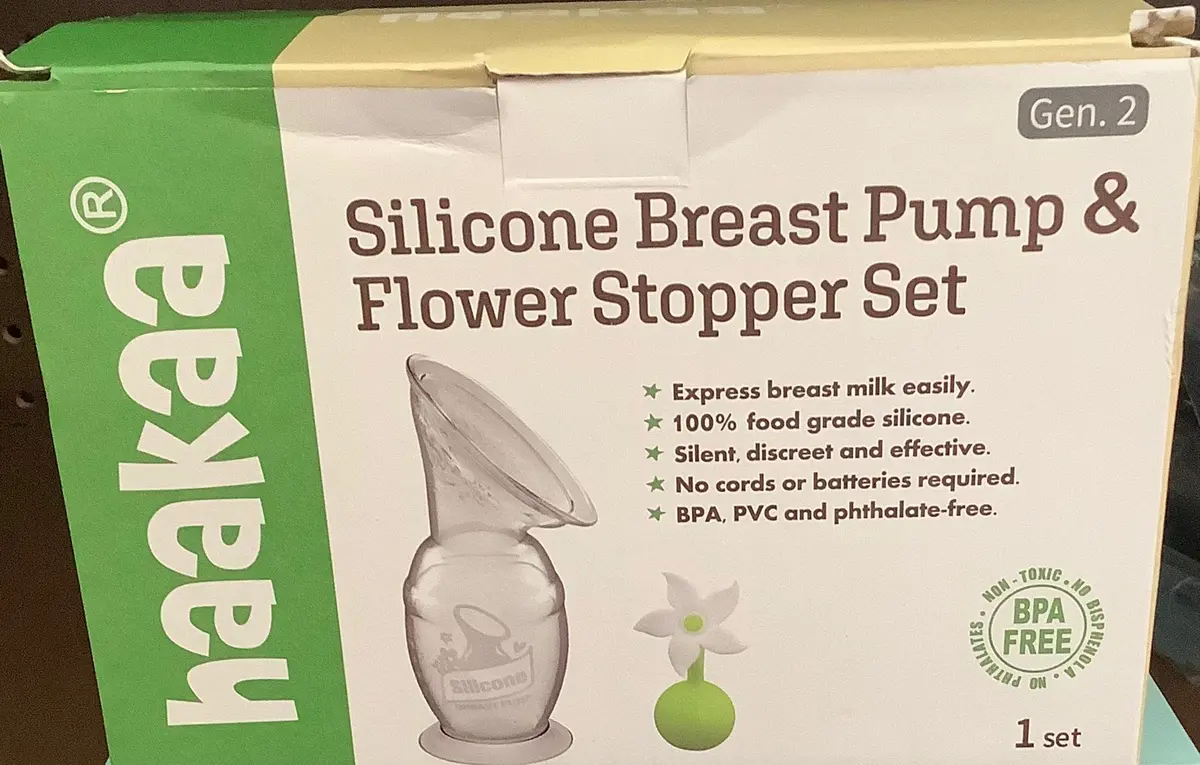 Haakaa Breast Pump With Suction Base And White Flower
Stopper - 5Oz 1